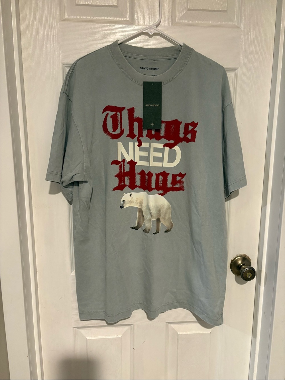 "Thugs Need Hugs" Santo Studio Light Gray Graphic Tee with Red & White Print